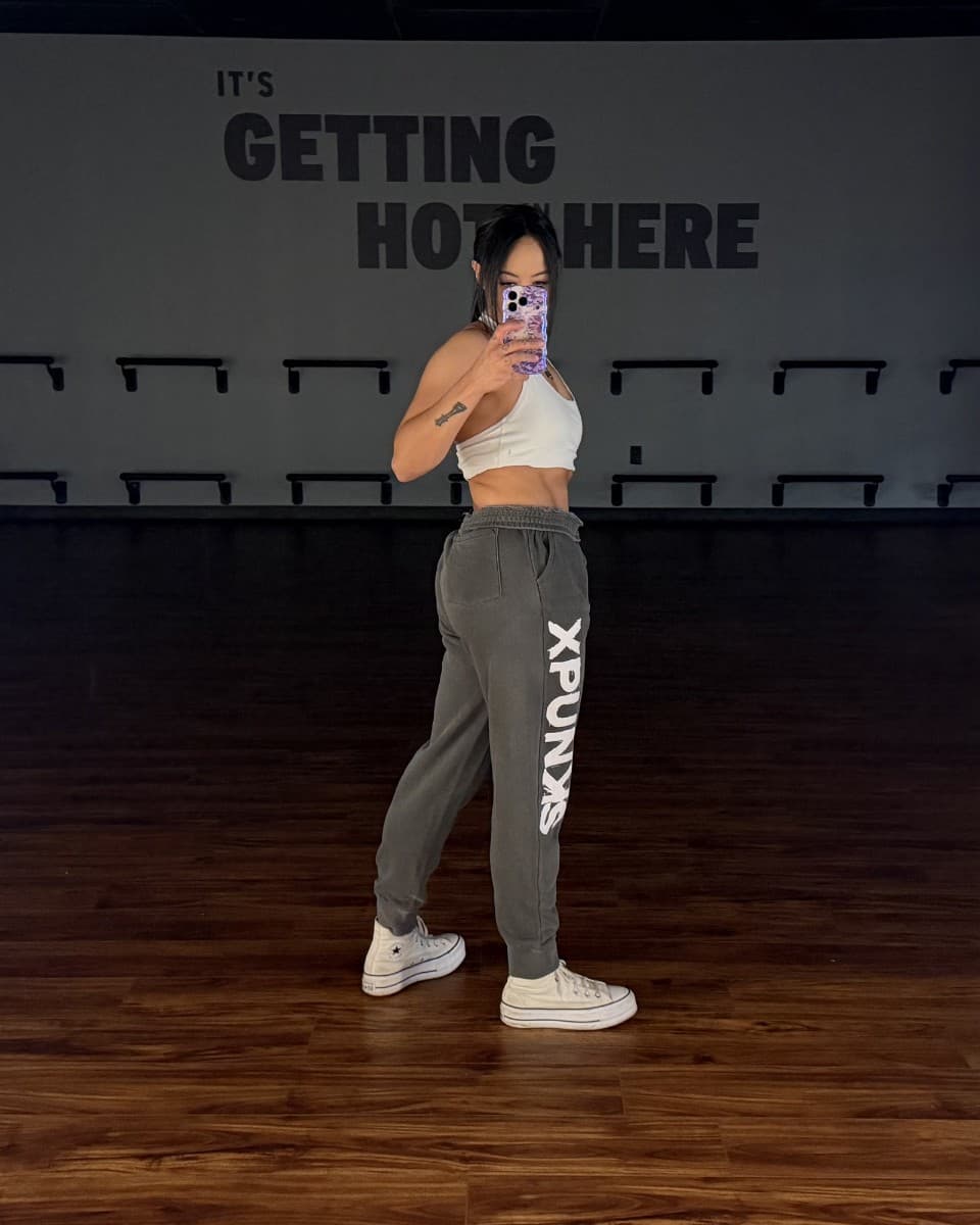 Cold Wallet joggers in Pigment Black with a distressed xPUNKS wordmark down the leg.